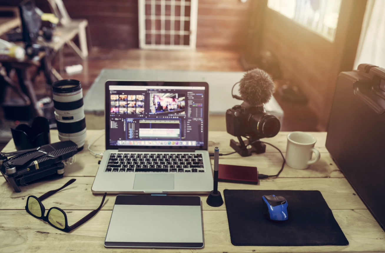 YouTuber setting up studio lights and camera to record high-quality content.