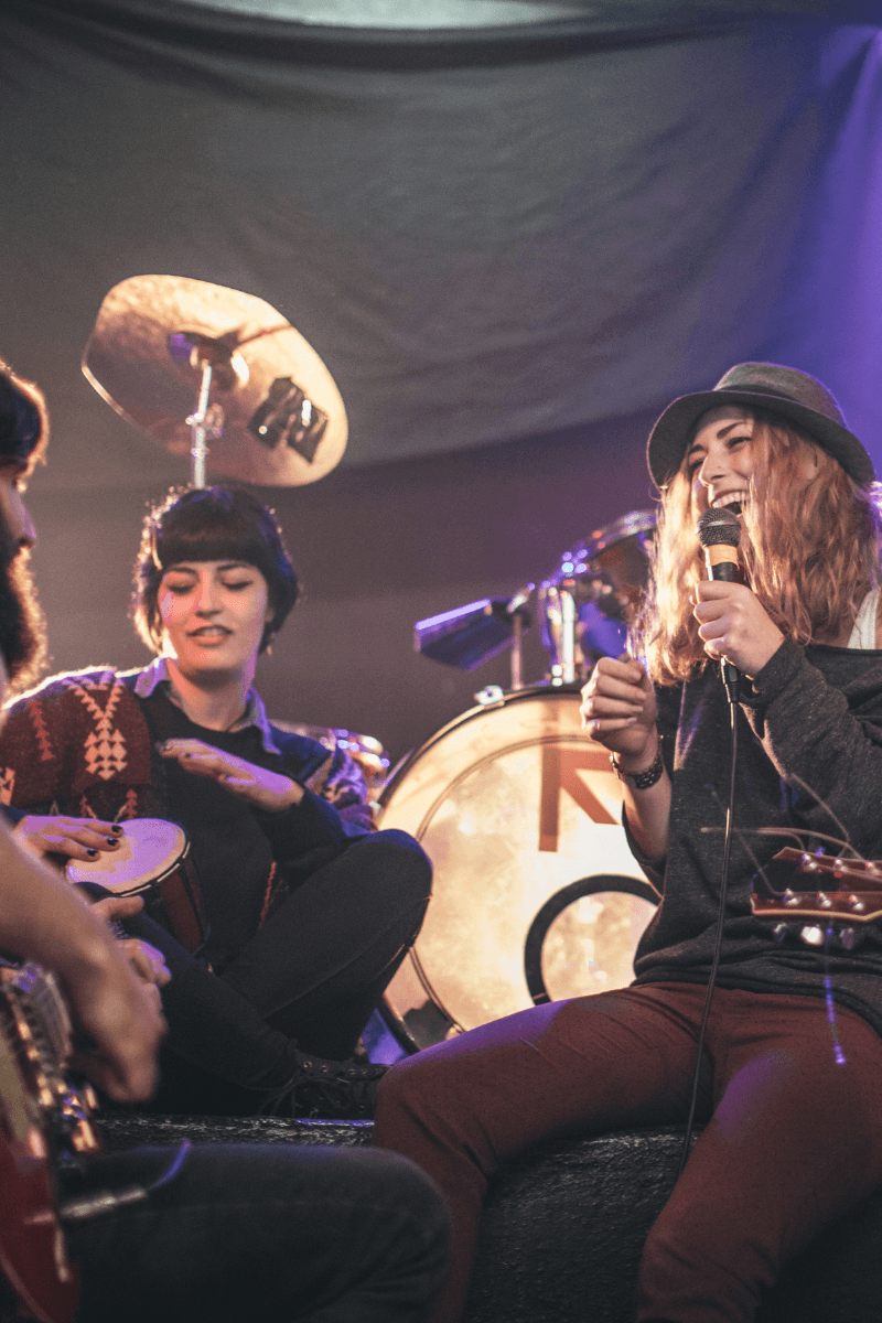 Music manager and artist reviewing plans on a tablet